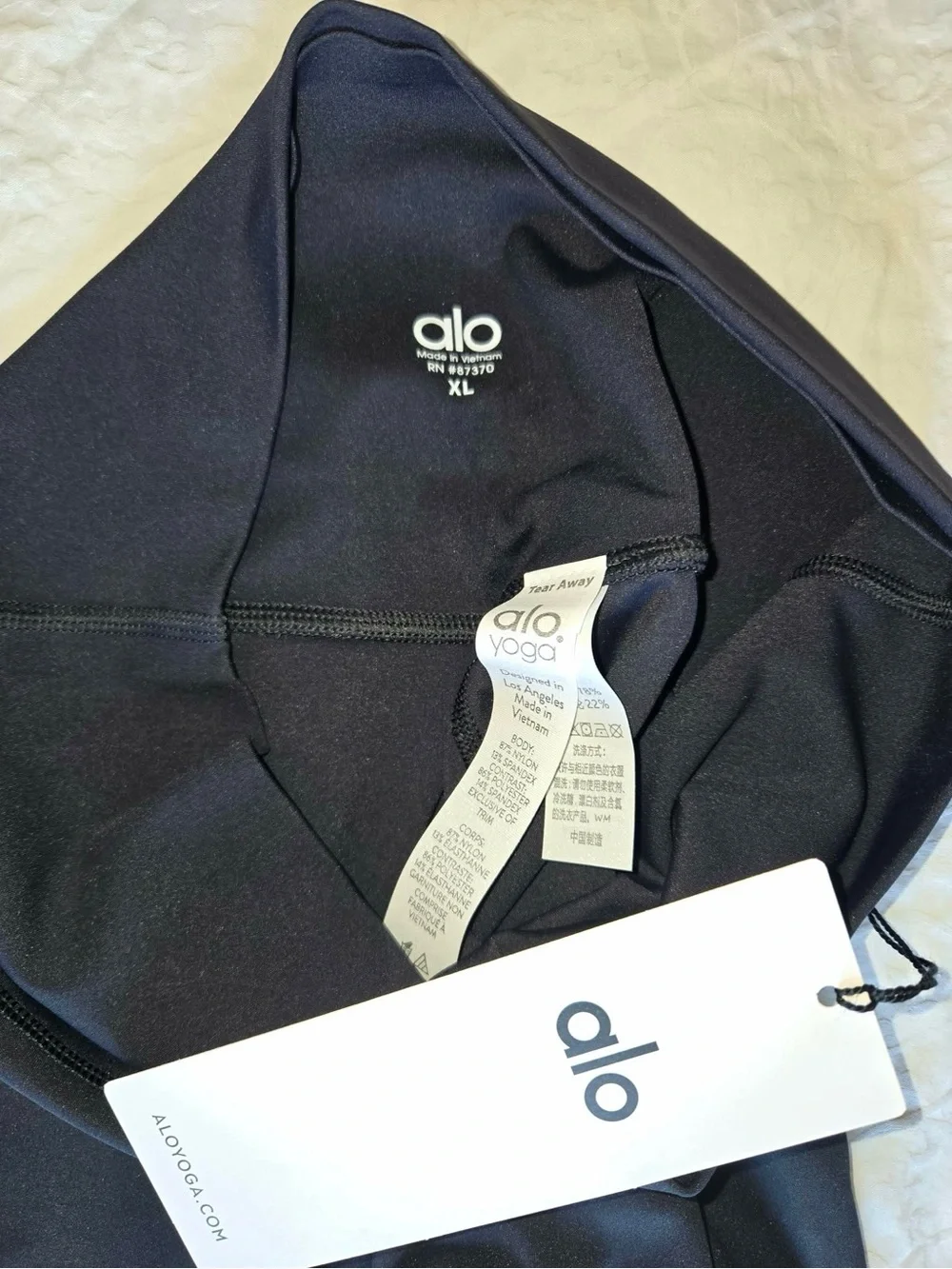 Alo Yoga leggings in a women's size XL, Black NWT